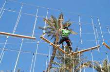 Thumbnail Students doing the obstacle course at the adventure park