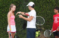 Thumbnail tennis lessons being given by ISC monitors at our tennis summer camp